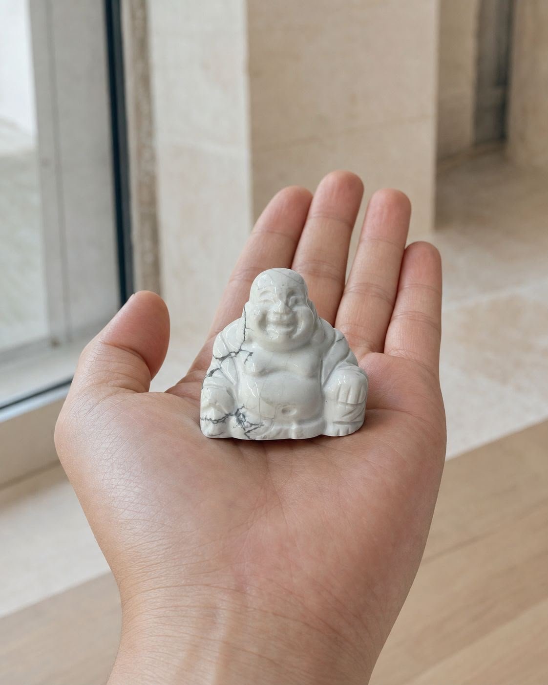 White Howlite Buddha, hand-carved gemstone sculpture in natural white howlite, alternate view