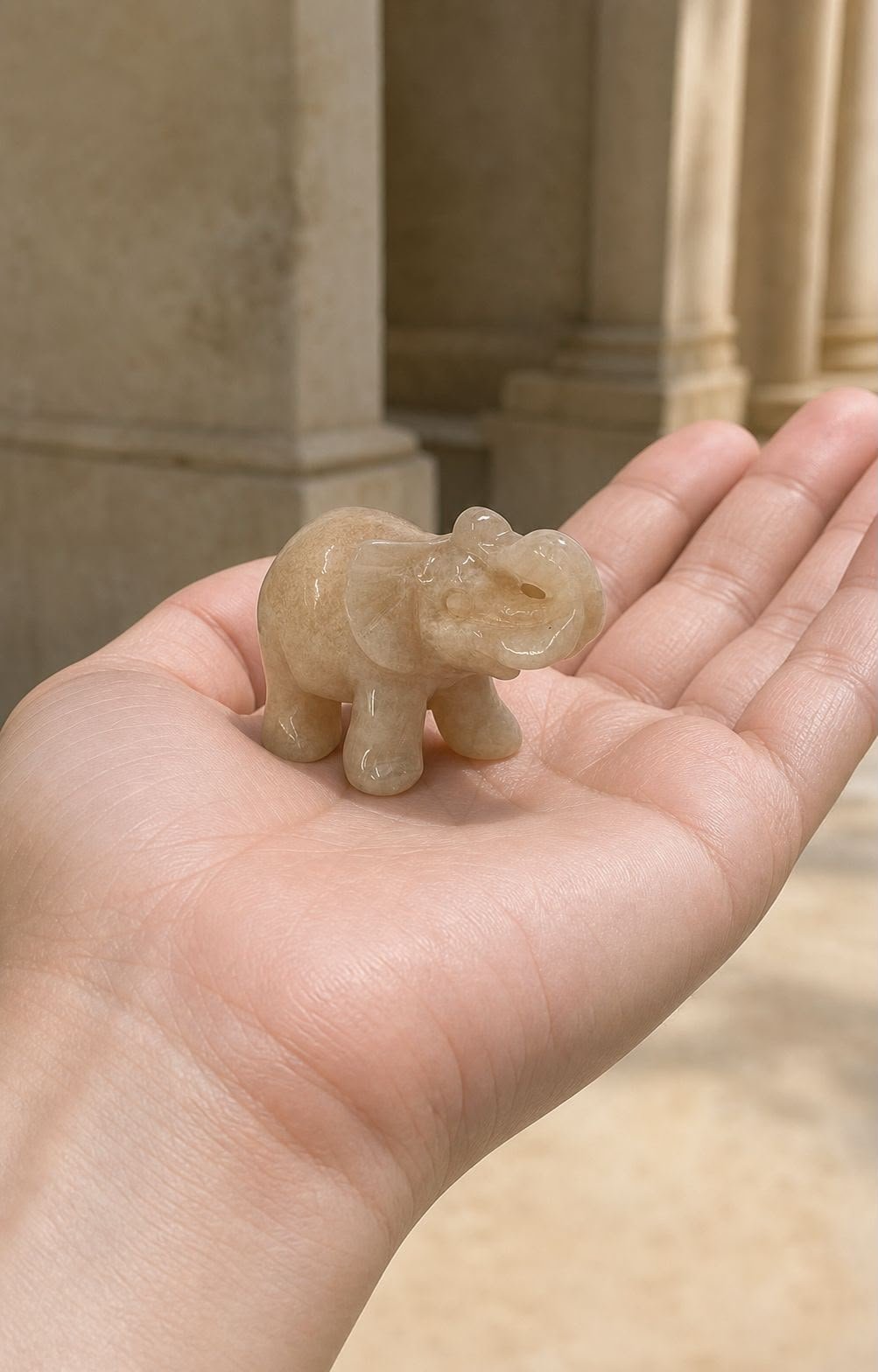 Peach Moonstone Elephant, hand-carved gemstone sculpture in natural peach moonstone, alternate view