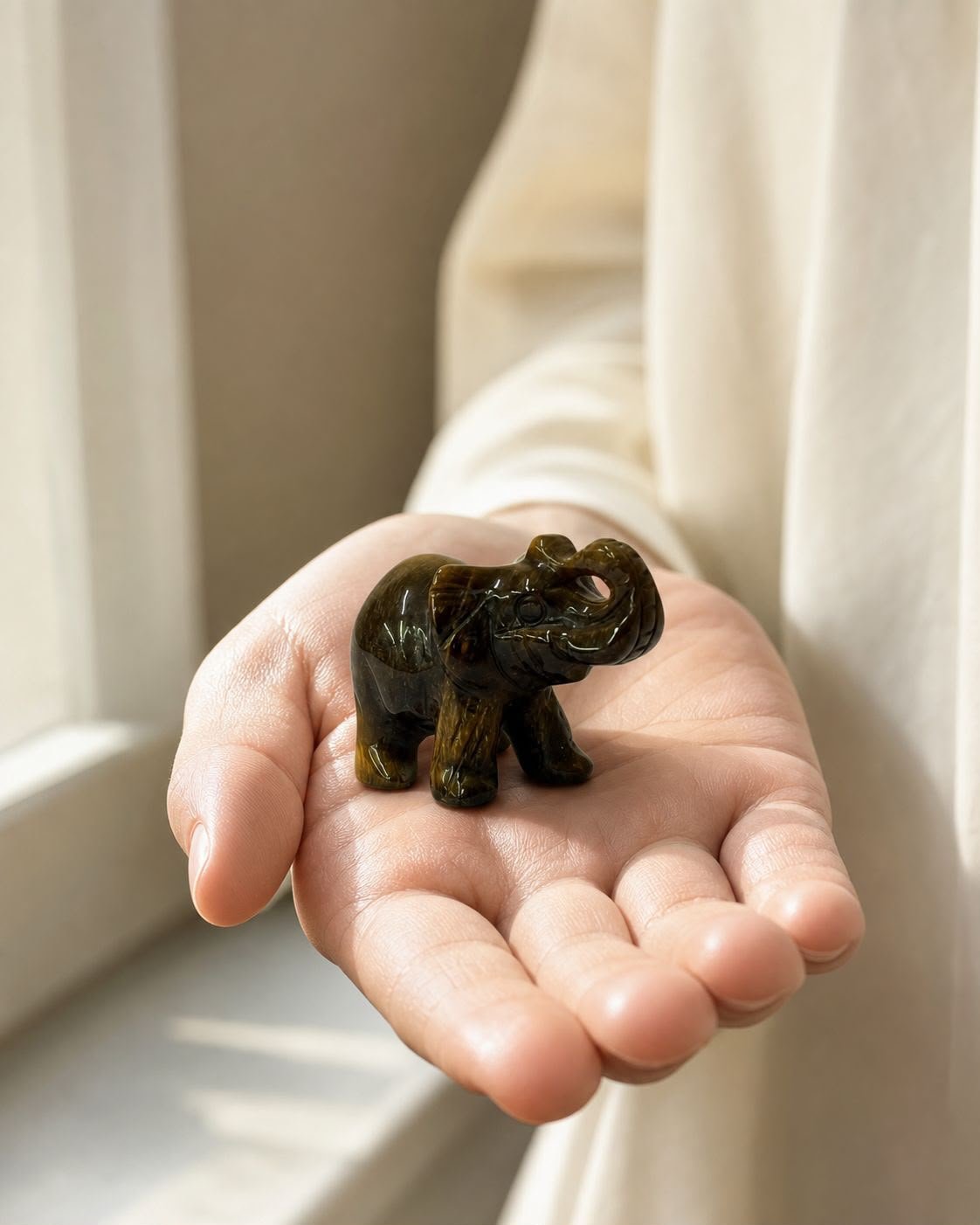 Brown Tiger Eye Elephant, hand-carved gemstone sculpture in natural brown tiger eye, alternate view
